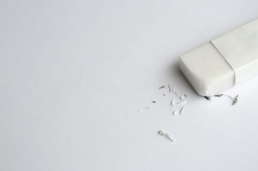 Top view of eraser on white cover background with customizable space for text