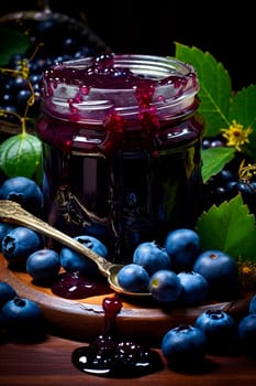 Blueberry jam in a jar. Selective focus. Food.