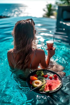 woman in the pool with fruit and cocktail. Selective focus. nature.