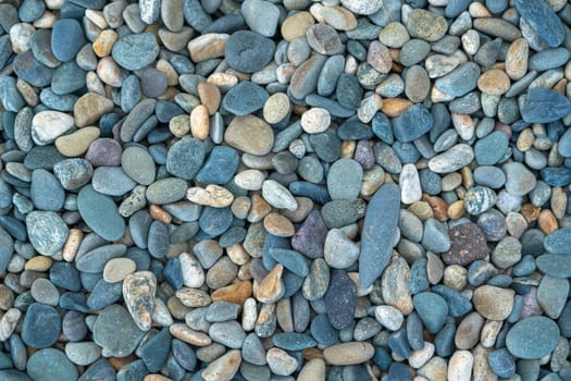 the texture of the pebbles in close-up as a background. photo