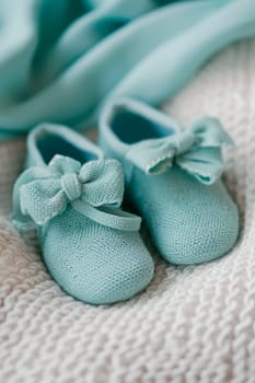 baby booties on a white background. Selective focus. kid.