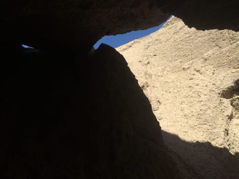 Inside Tapiado Mud Caves, Anza Borrego State Park, Black Copy Space. High quality photo