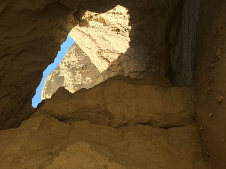 Exploring inside Arroyo Tapiado Mud Caves in Anza Borrego State Park. High quality photo