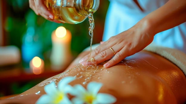 Cosmetic oil in a spa salon on a woman's back. Selective focus. People.