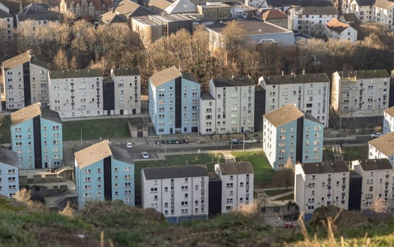Edinburgh, Scotland - Jan 17, 2024 - Aerial view of modern apartment buildings in Dumbiedykes housing estate area. Tenement houses, Blocks and flats, Residential modern architecture in Edinburgh city centre Scotland, Space for text, Selective focus.