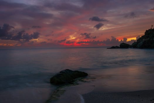 View of a peaceful sunset and waves on Shell Beach, Saint Barthélemy (St. Barts)