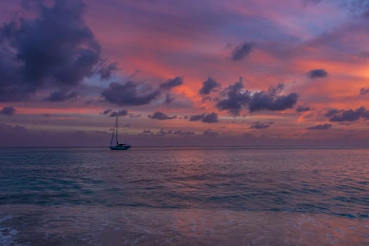 View of a peaceful sunset and waves on Shell Beach, Saint Barthélemy (St. Barts)