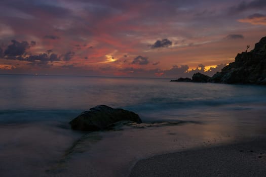 View of a peaceful sunset and waves on Shell Beach, Saint Barthélemy (St. Barts)