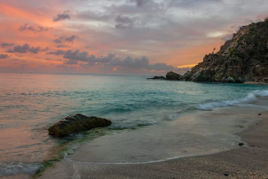 View of a peaceful sunset and waves on Shell Beach, Saint Barthélemy (St. Barts)