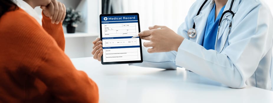 Laptop display medical report or diagnostic result of patient health on blurred background of doctor's appointment in hospital. Medical consultation and healthcare treatment. Panorama Rigid