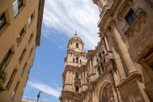 Malaga, Spain - May 24, 2019: Exterior view of the cathedral in the historic city center.