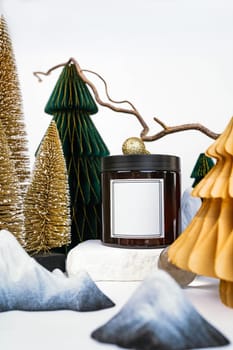 dark jar with lid on the background of Christmas decorations