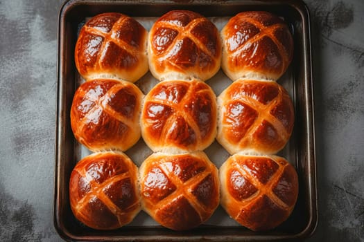 Traditional Easter hot cross buns on a baking tray. AI generated.