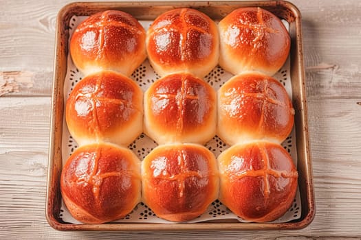 Traditional Easter hot cross buns on a baking tray. AI generated.