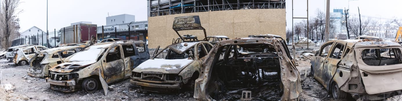 Kyiv, Ukraine - January 3, 2024: Burned civilians cars after a Russian's missiles attack.