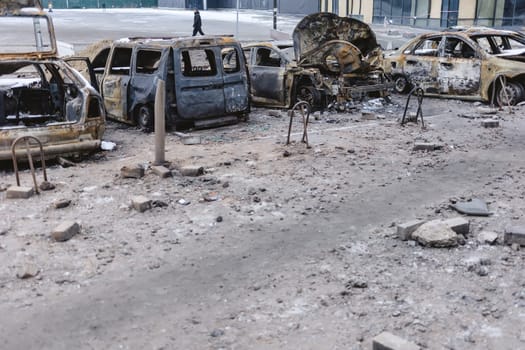 Kyiv, Ukraine - January 3, 2024: Burned civilians cars after a Russian's missiles attack.