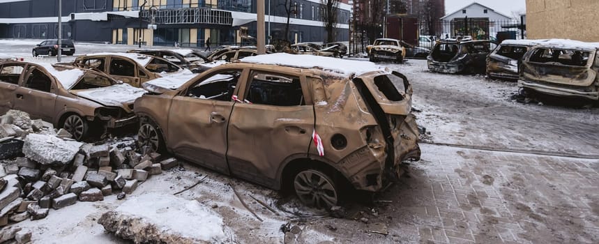 Kyiv, Ukraine - January 3, 2024: Burned civilians cars after a Russian's missiles attack.