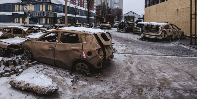 Kyiv, Ukraine - January 3, 2024: Burned civilians cars after a Russian's missiles attack.