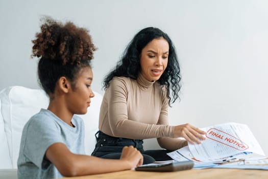 Stressed African American women has financial problems with credit card debt to pay crucial show concept of bad personal money and mortgage pay management crisis.