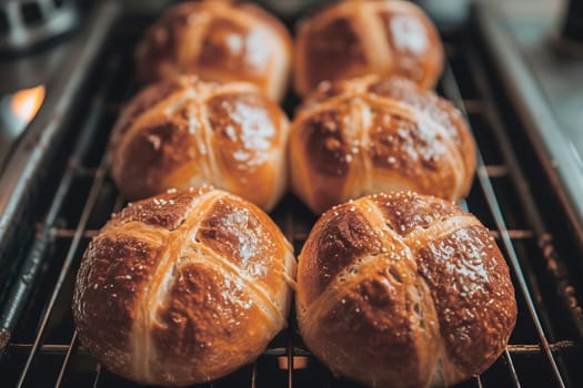 Traditional Easter hot cross buns on a cooling rack. AI generated.