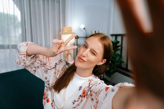 Woman influencer shoot live streaming vlog video review makeup utmost social media or blog. Happy young girl with cosmetics studio lighting for marketing recording session broadcasting online.