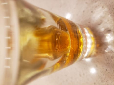 View of a Shot Glass with a Small Amount of Brandy in it
