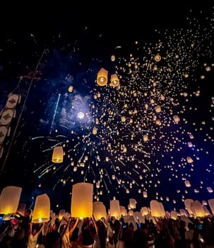 Sky lantern mass release event for Yee Peng and Loy Krathong festival in Chiang Mai, Thailand, south east asia