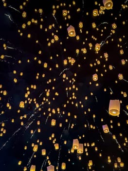 Sky lantern mass release event for Yee Peng and Loy Krathong festival in Chiang Mai, Thailand, south east asia