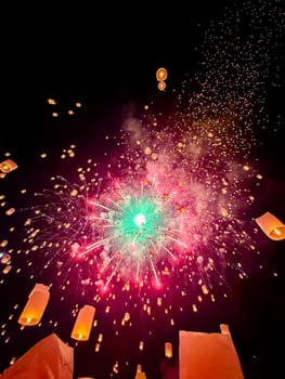 Sky lantern mass release event for Yee Peng and Loy Krathong festival in Chiang Mai, Thailand, south east asia