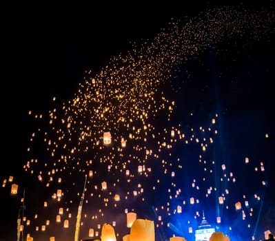 Sky lantern mass release event for Yee Peng and Loy Krathong festival in Chiang Mai, Thailand, south east asia