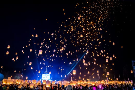 Sky lantern mass release event for Yee Peng and Loy Krathong festival in Chiang Mai, Thailand, south east asia