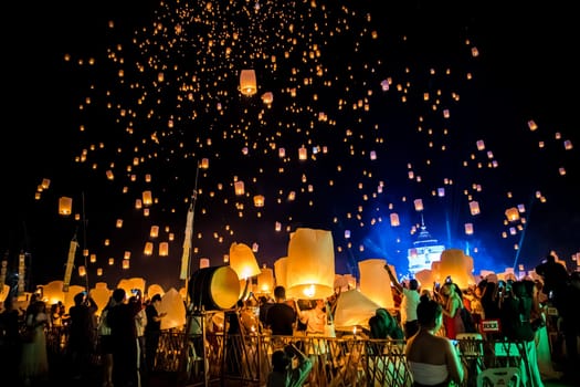 Sky lantern mass release event for Yee Peng and Loy Krathong festival in Chiang Mai, Thailand, south east asia