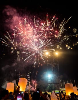 Sky lantern mass release event for Yee Peng and Loy Krathong festival in Chiang Mai, Thailand, south east asia