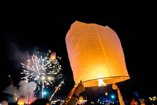 Sky lantern mass release event for Yee Peng and Loy Krathong festival in Chiang Mai, Thailand, south east asia