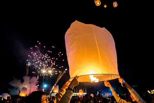 Sky lantern mass release event for Yee Peng and Loy Krathong festival in Chiang Mai, Thailand, south east asia