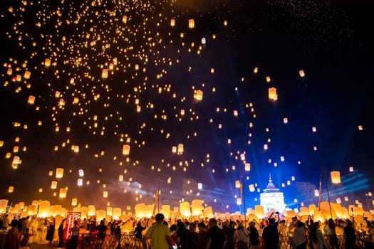 Sky lantern mass release event for Yee Peng and Loy Krathong festival in Chiang Mai, Thailand, south east asia