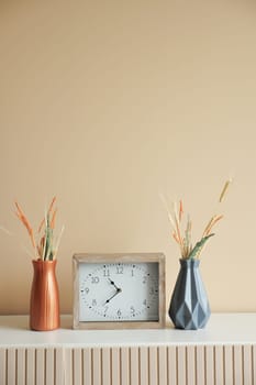 simple modern clock on table .