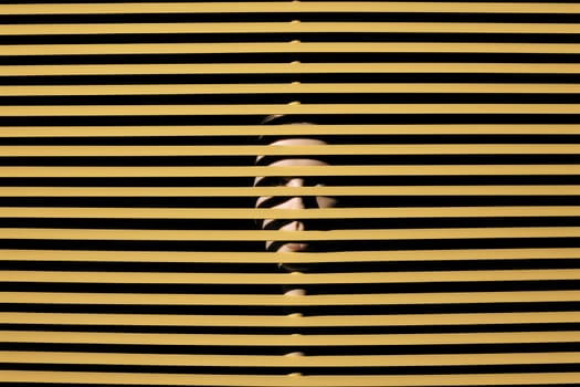 Scary eye peek out of strip lines abstract concept of unhappy vision minimal comeliness