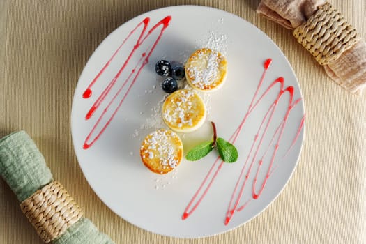 Sweet Symphony: A Trio of Tempting Treats on a White Platter