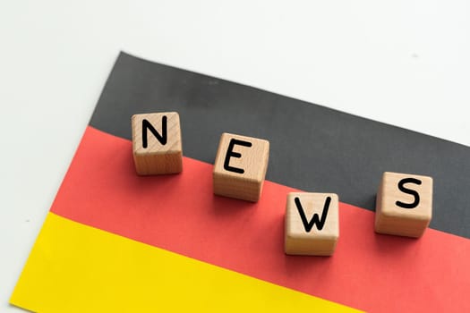 the word news and the flag of Germany . High quality photo