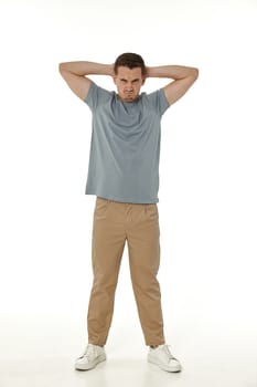 offended frustrated young man on white background. sadness