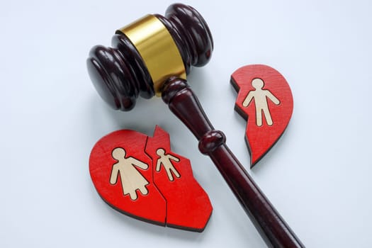 Gavel and broken heart as symbol of divorce, alimony and custody.