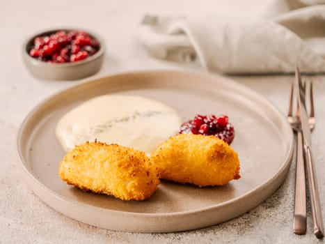 Crispy breaded cutlet. Dish with two perfect crunchy cutlet and potatoes puree on plate. Delicious fried cutlets in bread crumbs made from beef, pork, chicken meat or fish