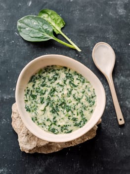Greeny rice porridge Dzhirkhyn - Ossetian, Caucasian and Jewish cuisine. Rice porridge with eggs, sour cream and fresh green as spinach and thyme