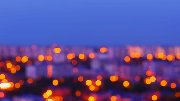 City night lights bokeh defocused background, abstract urban landscape