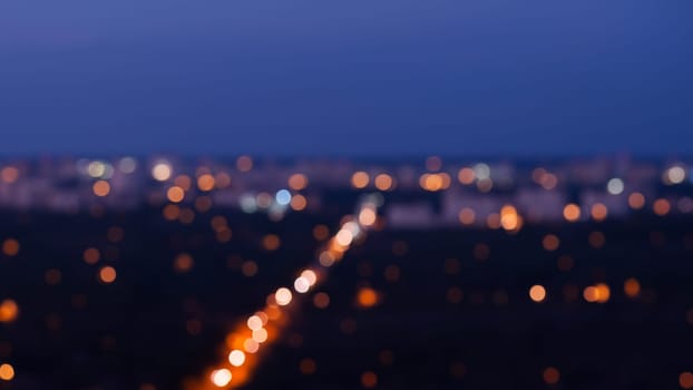 Bokeh of city at night, defocused abstract background.