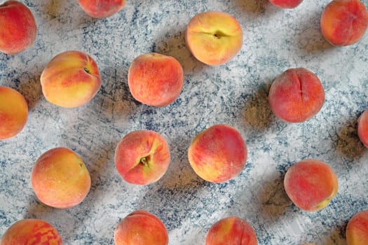 Top down view, apricots on blue marble like board