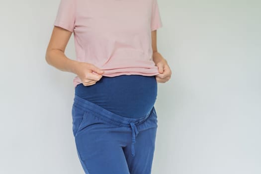 Chic maternity pants, comfy belly insert for expecting moms - stylish, practical, and perfect for the journey into motherhood.