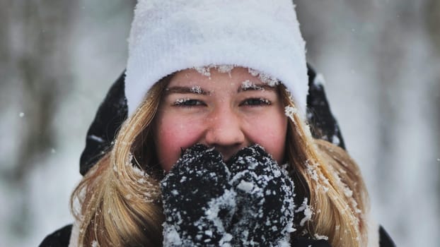 A young girl freezes in the woods in winter