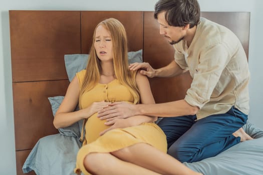 Expectant woman feels unwell, husband comforts and reassures her during a challenging pregnancy.